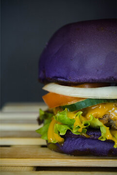 purple hamburger on a plate