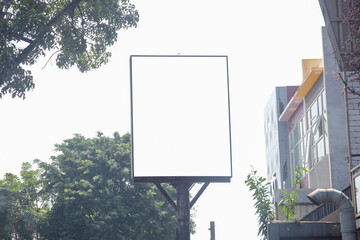 Blank billboard mock up for advertising on the pole in the city 