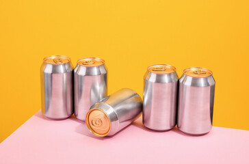 Aluminum cans on the table. Refreshing and tasty drinks.