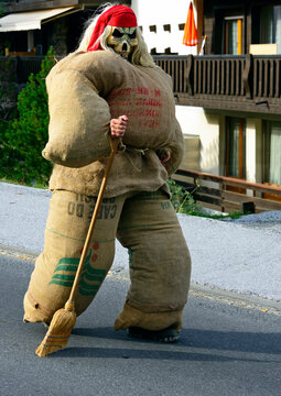 Nendaz, canton Valais, canton Wallis, Switzerland, Europe - young man disguised as Tsch&auml;gg&auml;tt&auml;, traditional Valasian frightening figure, International Alphorn Festival