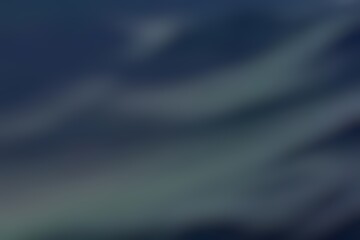 Abstract blurred background image of blue colors gradient used as an illustration. Designing posters or advertisements.