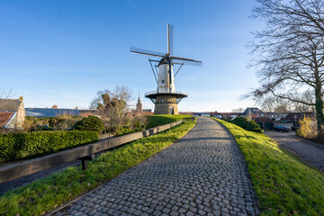 Windmill The With Juffer at Ijzendijke, Zeeland, The Netherlands. December 16 2023.