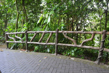 The concrete fence along the path is made 