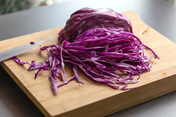 Fresh Organic Cut Slice Red Cabbage Close Up on Wooden Board - Wholesome and Colorful Delight