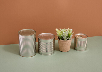 Assortment of cans of canned and green plant. Dinner and long term food storage.