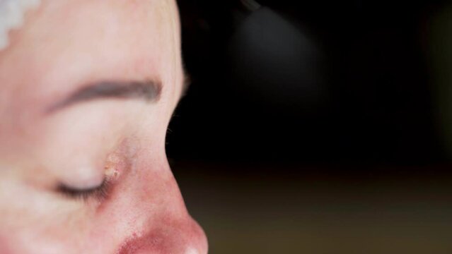 Rejuvenation And Hydration. Cosmetology concept. Cosmetologist doing hydrafacial procedure in Cosmetology clinic using hydra vacuum cleaner.