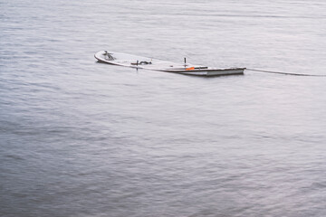 Wooden boat under water