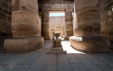 antique statue in the pillared hall in Luxor in Egypt