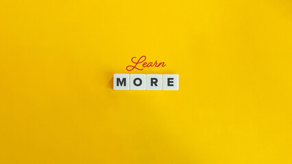 Learn More Banner. Block Letter Tiles and Cursive Text on Flat Yellow Orange Background. Minimalist Aesthetics.