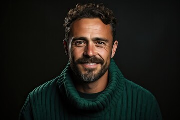 Fototapeta premium Portrait of Laughing Young Man in Emerald Sweater: Male Model