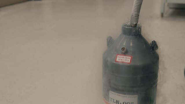 Vapor Development While Transferring Liquid Nitrogen from a Storage Tank to a Dewar - Close Up