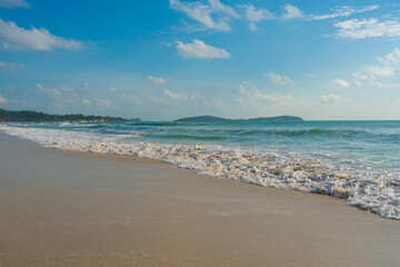 Fototapeta na wymiar Sea beach wave white sand beach morning sunrise nature landscape