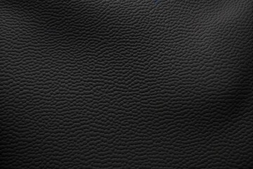 Black textured neoprene surface with detailed patterning 