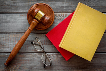 Law education concept - judge gavel and law book - obrazy, fototapety, plakaty