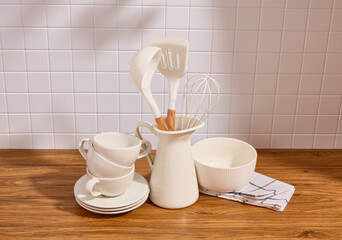 Cooking appliances and various dishes. Ceramic tableware, food preparation.