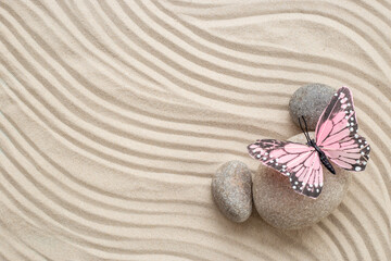 Zen stones with lines on sand. Purity harmony and balance concept