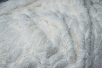 closeup of fluffy  bed linen in decoration store showroom