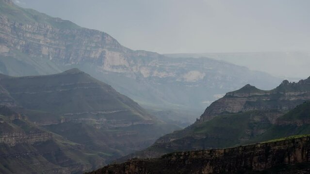 Mountain landscape against the background of optical haze. Static frame.