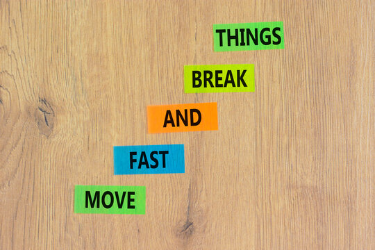 Move fast and break things symbol. Concept words Move fast and break things on colored paper. Beautiful wooden background. Business, move fast and break things concept. Copy space.