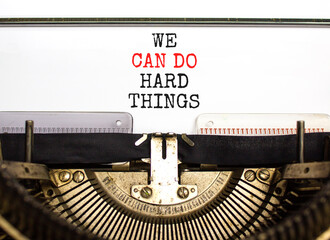 We can do hard things symbol. Concept words We can do hard things typed on beautiful old retro typewriter. Beautiful white background. Business, we can do hard things concept. Copy space.