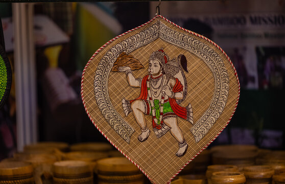 Hindu god ram idol made with jute canvas hanging on display. Selective focus with negative space.