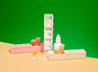 Various pill boxes and nasal spray. Health support.