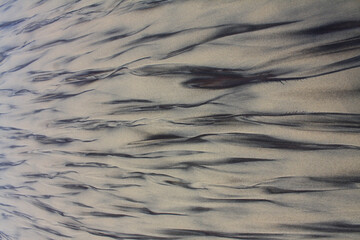 Graphic created by the receding water at low tide