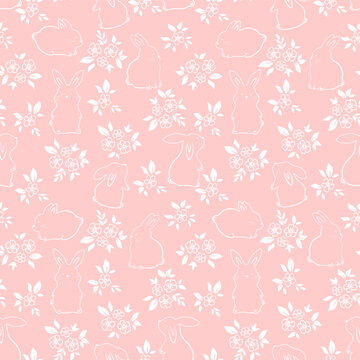 Seamless pattern of cute white rabbits on a pink background with floral elements.