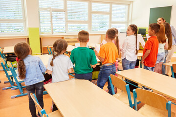 Group of students standing together in class