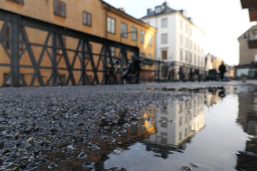 Close up of a puddle in city