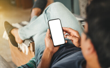 cell phone blank white screen mockup.hand holding texting using mobile on desk at office.background empty space for advertise.work people contact marketing business,technology