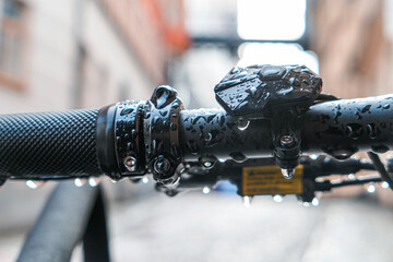 close-up of a wet bicycle handlebar