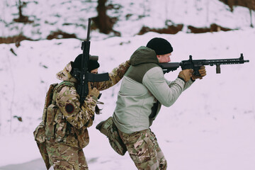 Military training. People training in tactical shooting.