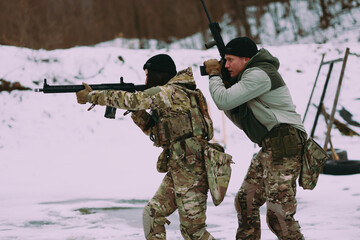 Fototapeta premium Military training. People training in tactical shooting.