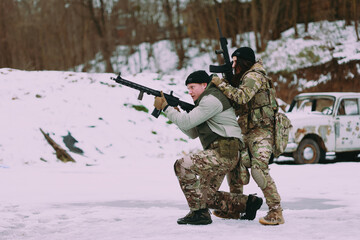 Military training. People training in tactical shooting.