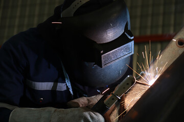 Steel welder builds technical, industrial steel welder in technical factory