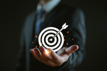 Startup business concept, businessman hands show goals and target for growing business, fast...
