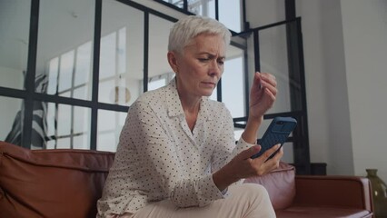 Senior Woman Upset with Smartphone