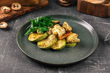 Portion of gourmet grilled vegetables with parsley