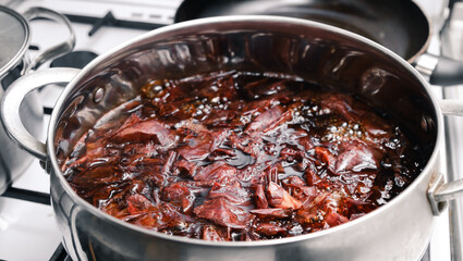 The eggs boiled in pot with onion peels for coloring. Preparation for Ester celebration. Traditional eco dye. Food cooking. High quality 4k footage