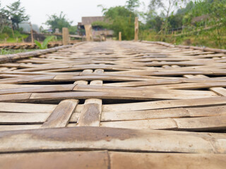 Fototapeta na wymiar Bridge made of bamboo Used to decorate coffee shops tourist attraction or used to cross small rivers