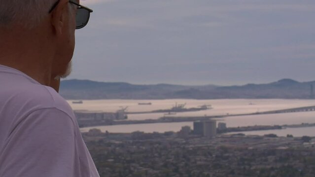Older Man Gazes at the San Francisco Bay Area