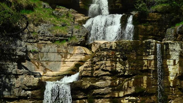 View on the middle part of a threefold waterfall