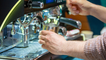Barista coffee service concept.Barista women using coffee machine to make coffee in cafe