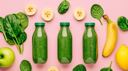 Deurstickers Healthy detox smoothie with kiwi, avocado, banana, apple and spinach. Green smoothie on pink background. © ksu_ok