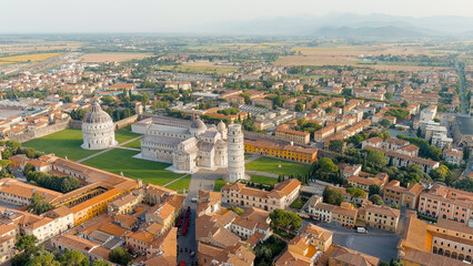 Pisa, Italy. Famous Leaning Tower and Pisa Cathedral in Piazza dei Miracoli. Summer. Morning hours, Aerial View - obrazy, fototapety, plakaty