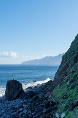 Waves crashing at the harsh coast line of Madeira 