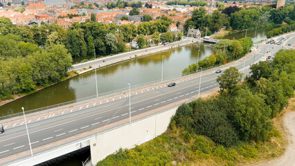 Bruges, Belgium. Katelijnepoort - Swing bridge. Kanaal Gent-Brugge. Panorama of the city from the...