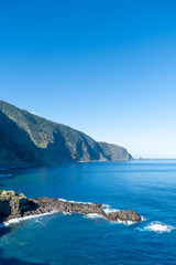 Waves crashing at the harsh coast line of Madeira 
