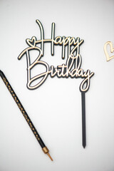 Happy birthday sign for cake on white background